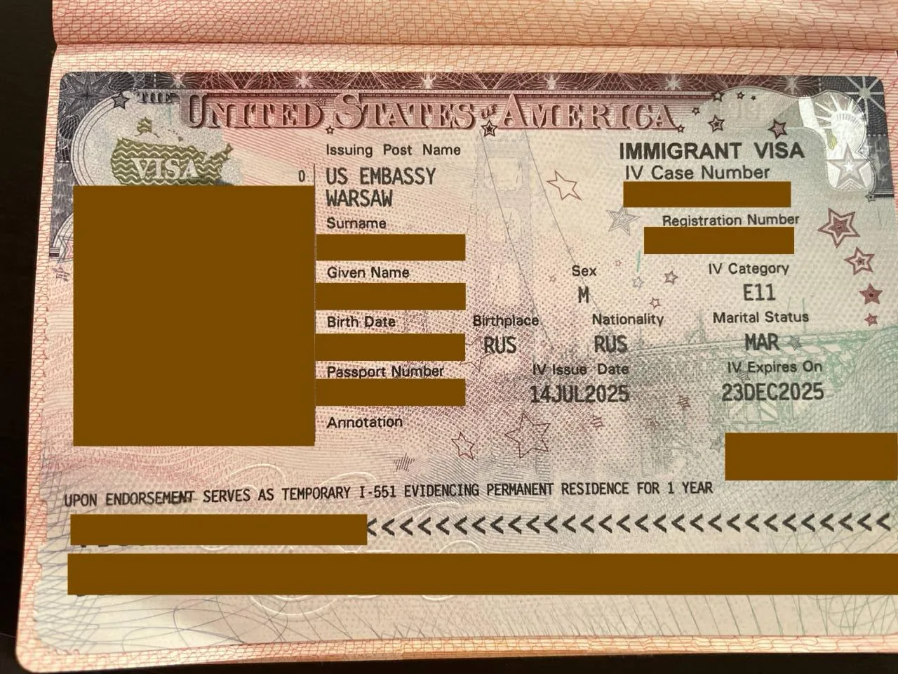 Close-up of a U.S. immigrant visa document used as a visual for immigration and tax residency topics